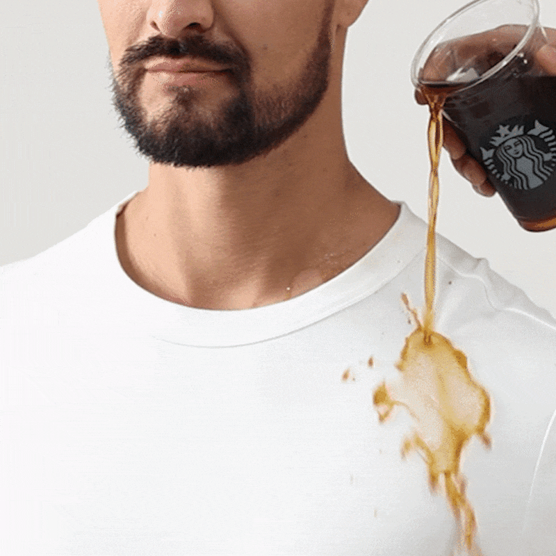 Water droplet beading off TexTale FRESH stain-repellent tee — Earth Day 2026 sustainability
